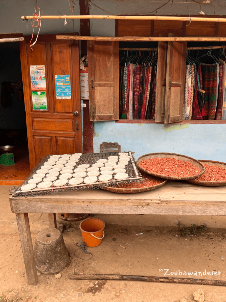 Sunning rice crackers and peanuts, Muang Ngoi